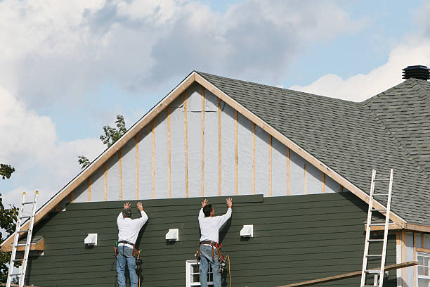 Professional Siding Installation technician working in Ebony, VA